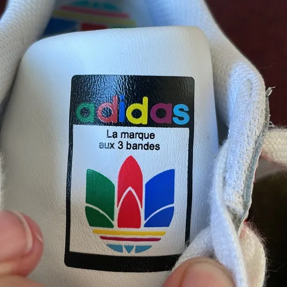 Adidas SuperStar shell top with multicolored trefoil on side