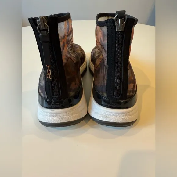 Ash sneaks
