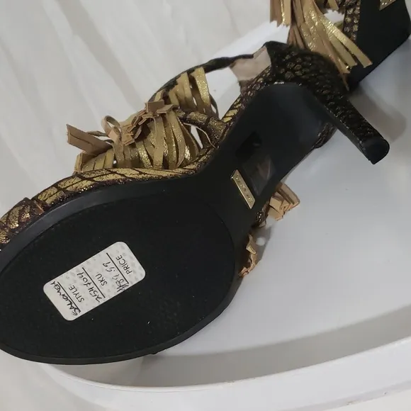 Bebe black and Gold Heels size 6