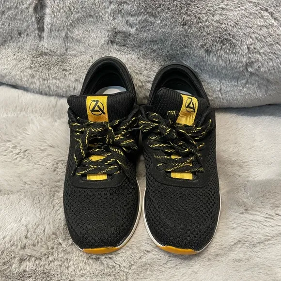 Black and Yellow Athletic Shoes