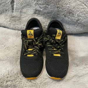 Black and Yellow Athletic Shoes