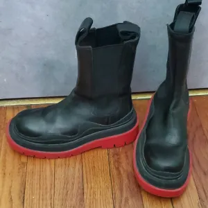 Black Boots with Red Soles