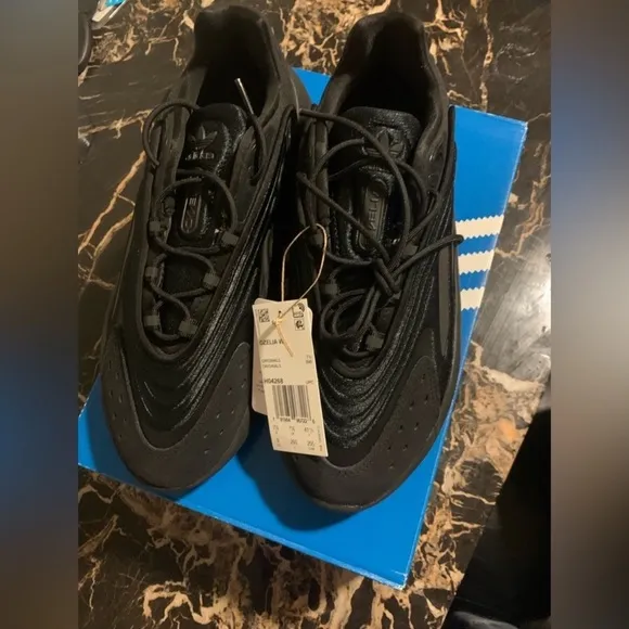 Brand new unisex black Ozelia sneakers adidas