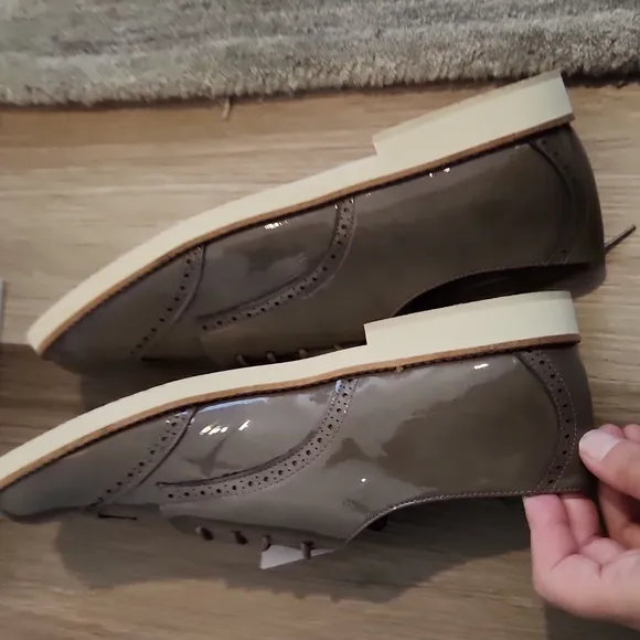 Brown patent leather dress shoes