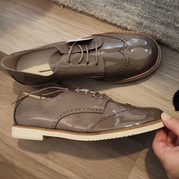 Brown patent leather dress shoes