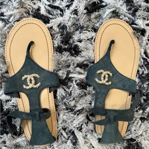 Chic Black Sandals with Gold Accents