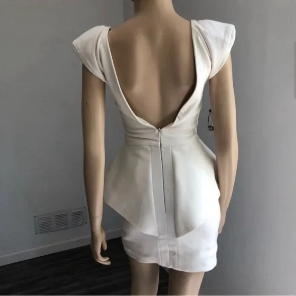 Chloe Sims' Aqua By Aqua Claudia Cream Peplum Waist Dress