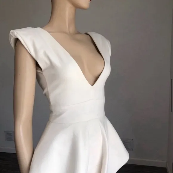 Chloe Sims' Aqua By Aqua Claudia Cream Peplum Waist Dress