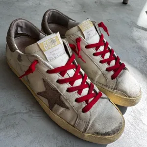Cream Golden Goose Sneakers with red laces
