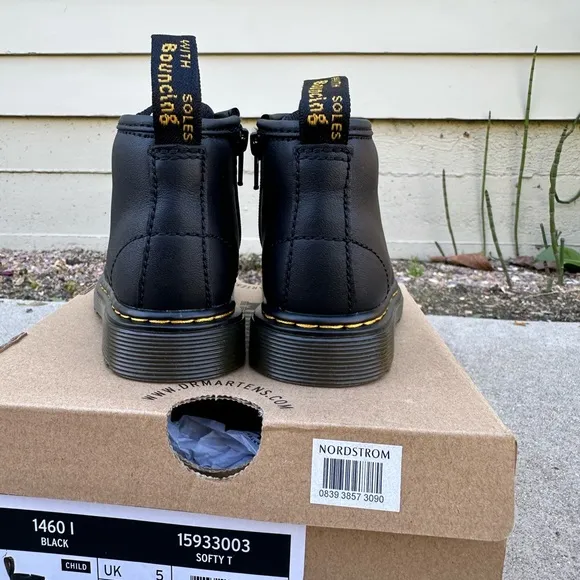 Dr. Martens toddler size 6 black boots. Brand new, never worn.