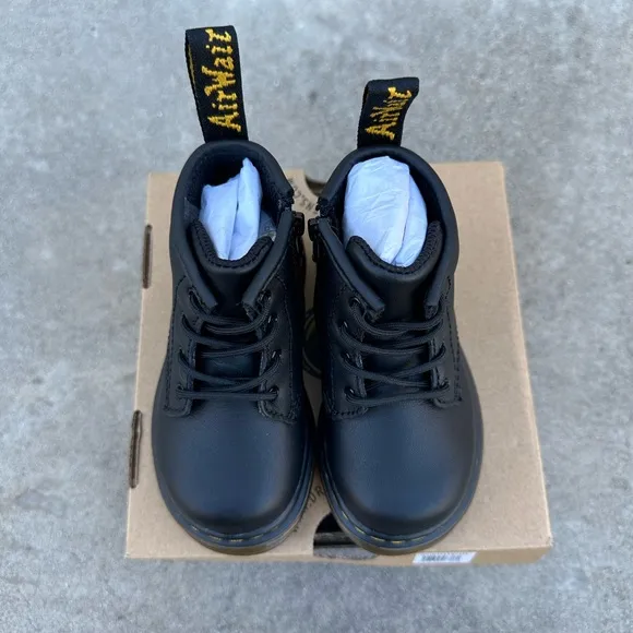 Dr. Martens toddler size 6 black boots. Brand new, never worn.
