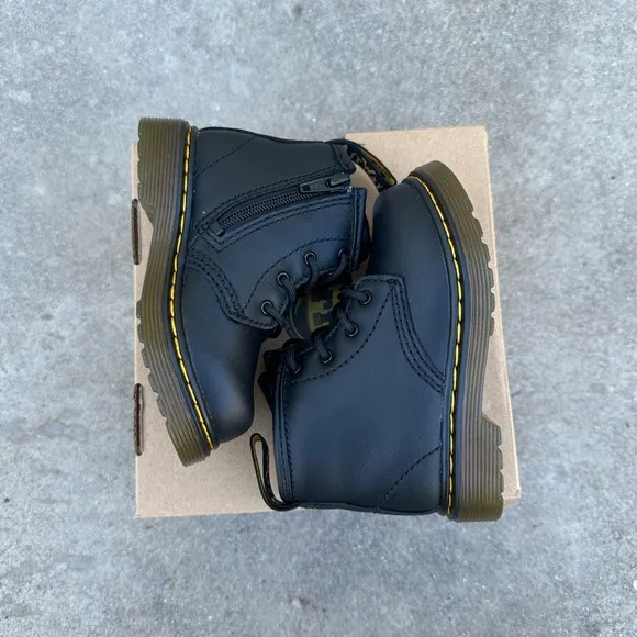 Dr. Martens toddler size 6 black boots. Brand new, never worn.