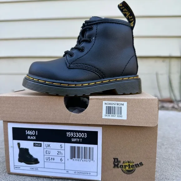 Dr. Martens toddler size 6 black boots. Brand new, never worn.