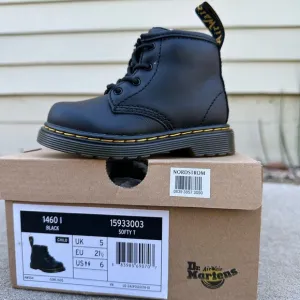 Dr. Martens toddler size 6 black boots. Brand new, never worn.