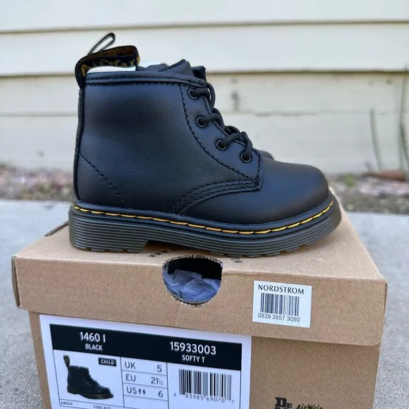Dr. Martens toddler size 6 black boots. Brand new, never worn.