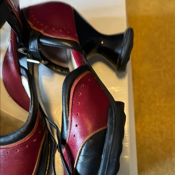 John Fluevog QTee Black and Cherry Buckle heels size 8 ( typical size 8.5)
