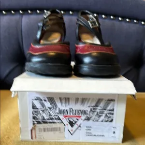 John Fluevog QTee Black and Cherry Buckle heels size 8 ( typical size 8.5)