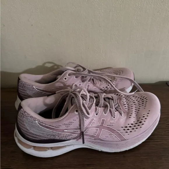Mauve pink ASICS running shoes