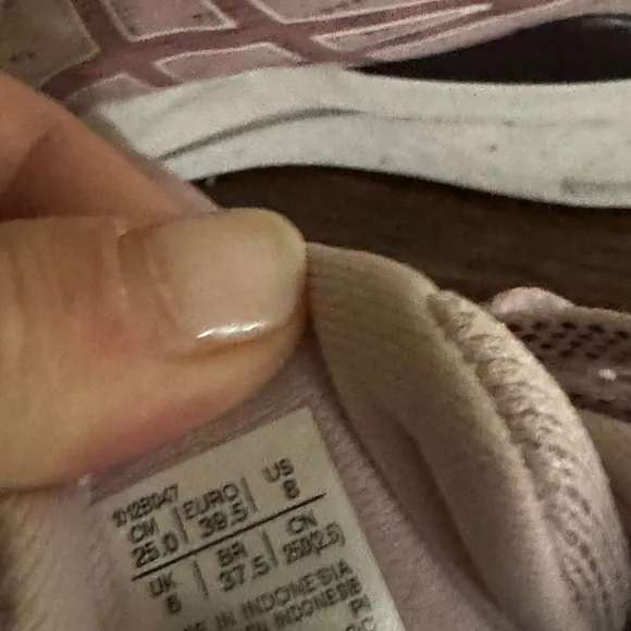 Mauve pink ASICS running shoes