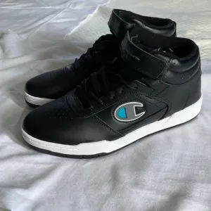 Men’s champion leather sneakers brand new without tags.