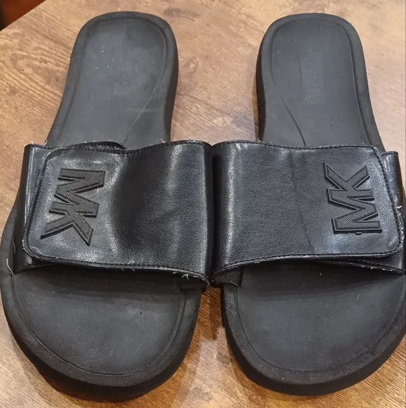 Michael Kors black leather unisex sandals
