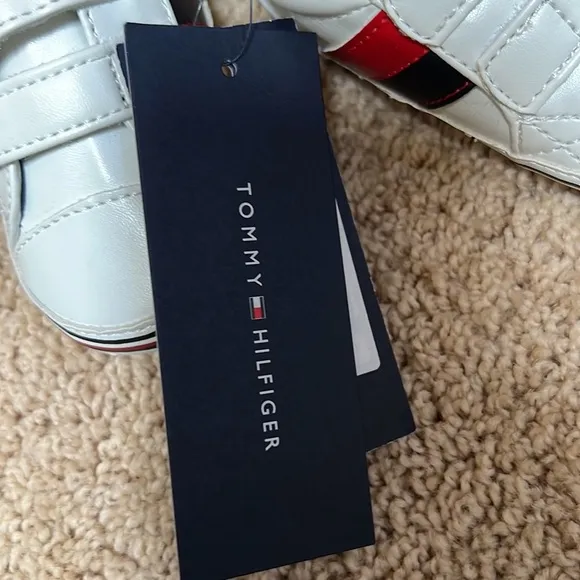 New! Tommy Hilfiger SZ 4, 9-12 months white with logo Velcro shoes.