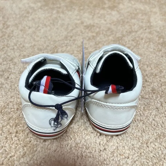 New! Tommy Hilfiger SZ 4, 9-12 months white with logo Velcro shoes.