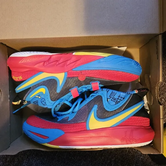 Nike Blue and Red Sneakers with Sleek Design