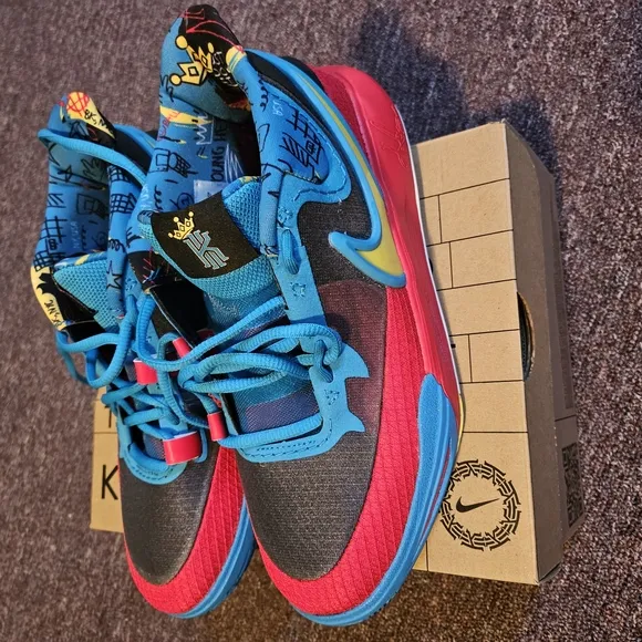 Nike Blue and Red Sneakers with Sleek Design
