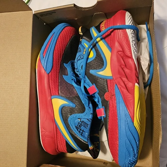 Nike Blue and Red Sneakers with Sleek Design