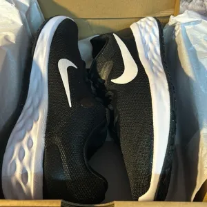 NIKE Revolution Sneakers size 9.5