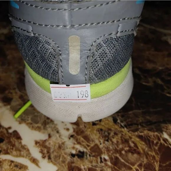 Nike women's Flex Run running shoes gray size 8.5.       A198