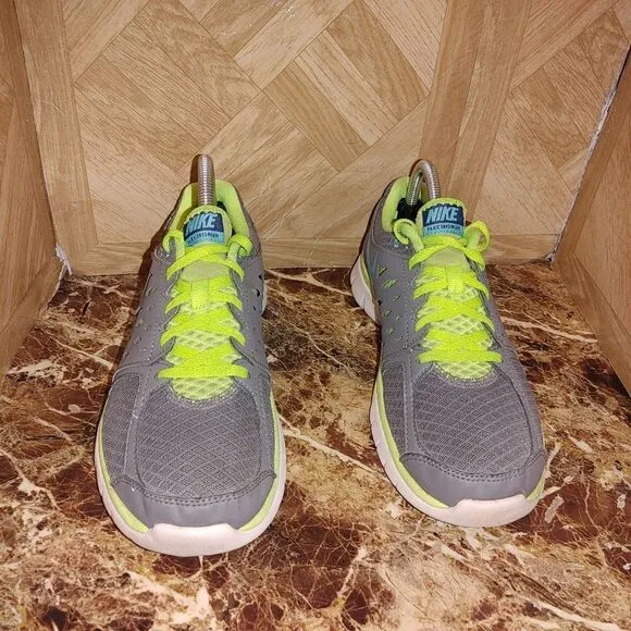 Nike women's Flex Run running shoes gray size 8.5.       A198