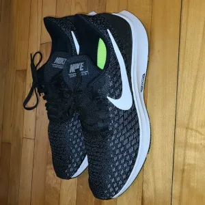 NWOT- NIKE ZOOM BLACK AND GRAY.  SIZE 12 WOMAN'S SNEAKERS.  BRAND NEW!!!!