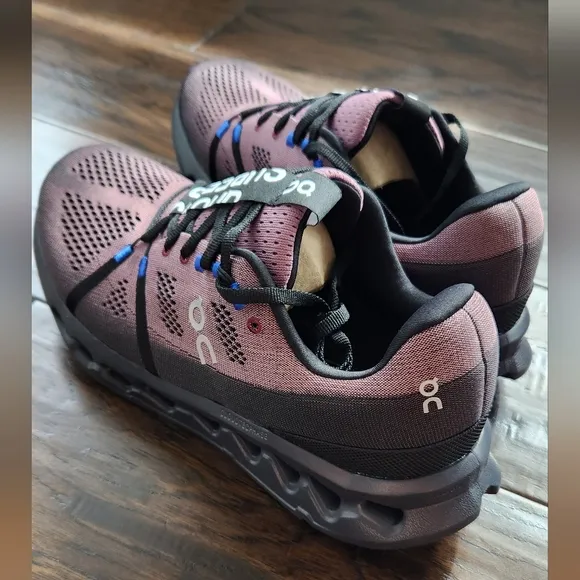 On Men's Cloudsurfer Running Shoes. Size 11.5, black/cobalt. New with box.