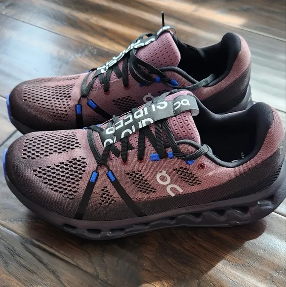 On Men's Cloudsurfer Running Shoes. Size 11.5, black/cobalt. New with box.