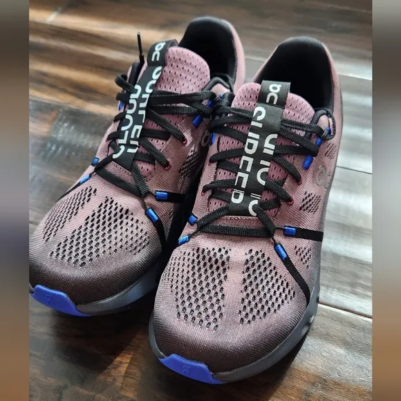 On Men's Cloudsurfer Running Shoes. Size 11.5, black/cobalt. New with box.
