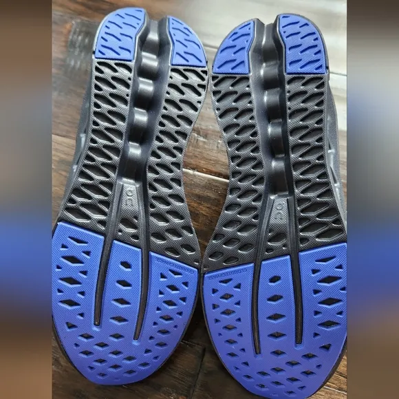 On Men's Cloudsurfer Running Shoes. Size 11.5, black/cobalt. New with box.