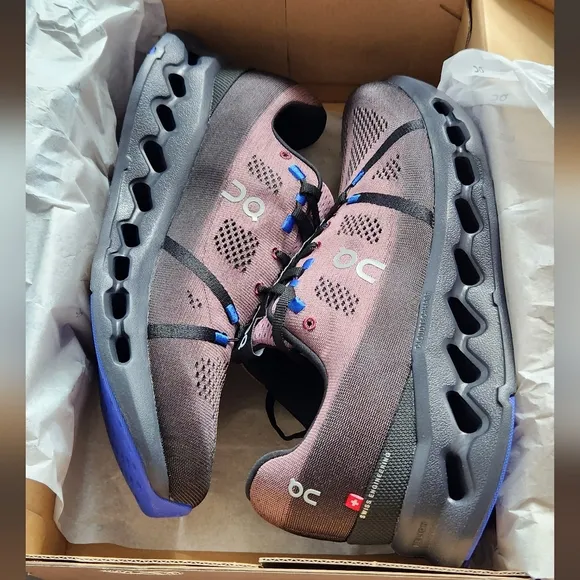 On Men's Cloudsurfer Running Shoes. Size 11.5, black/cobalt. New with box.