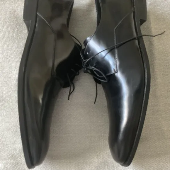Prada men’s black leather dress shoes,