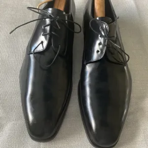 Prada men’s black leather dress shoes,