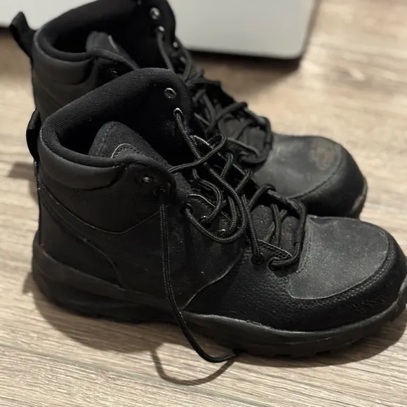 Preowned youth Nike boots. Size 5.5