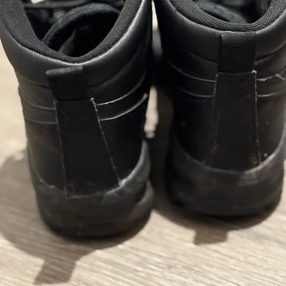 Preowned youth Nike boots. Size 5.5