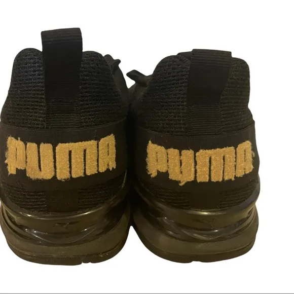 PUMA mens AXELION black running shoes
