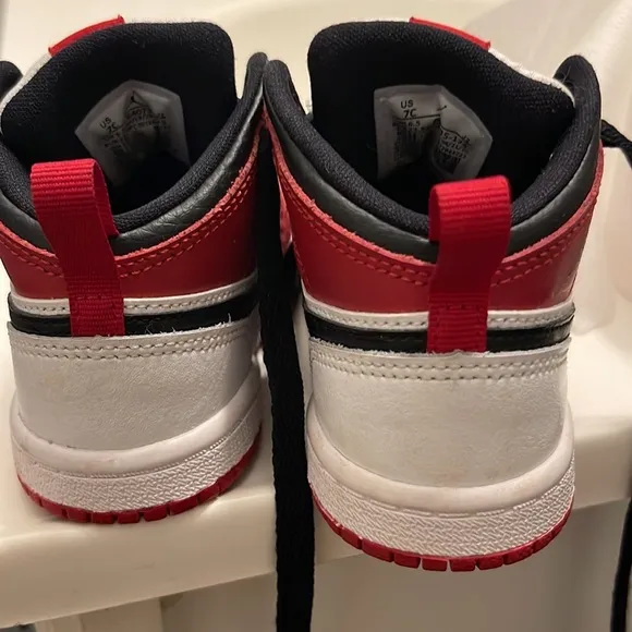 Red and white Jordans
