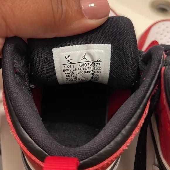Red and white Jordans