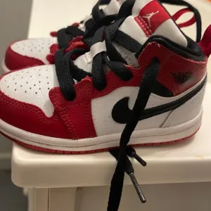 Red and white Jordans