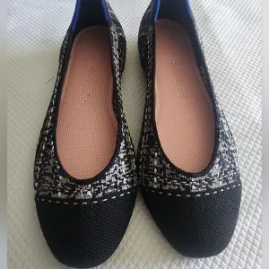 Rothy's Women's Black and White Flats
