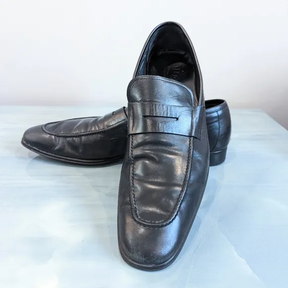 Salvatore Ferragamo black leather shoes