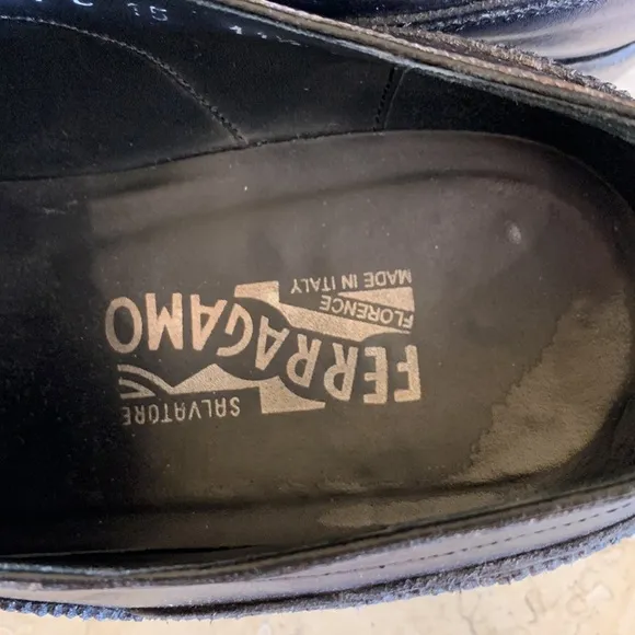 Salvatore Ferragamo black oxfords. Lace up. Detailing on front. Sz 11 1/2.